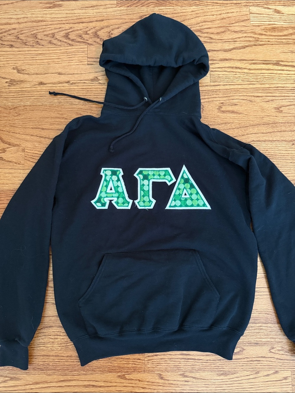 Aloha Gamma Delta Jerzees Black Hoodie with Green Greek Letters